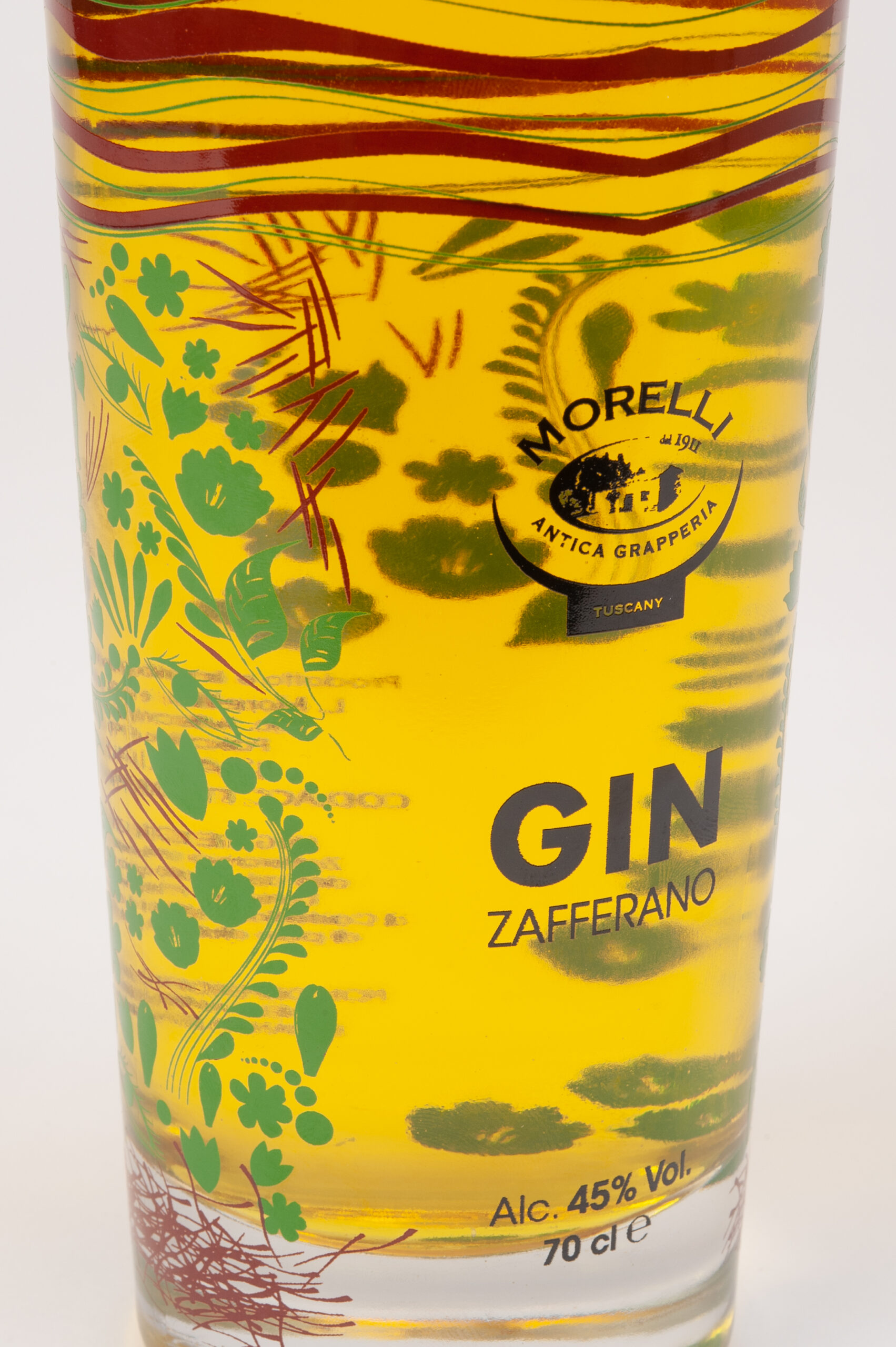 Bottiglia Gin allo Zafferano Morelli con etichetta gialla decorata